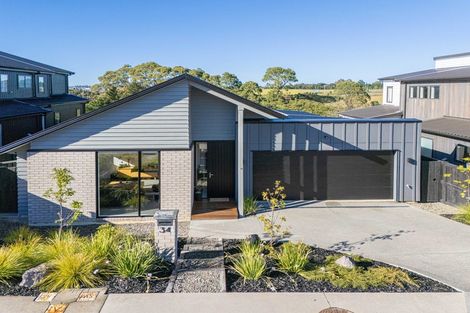 Photo of property in 34 Paparahi Place, Wainui, Silverdale, 0992