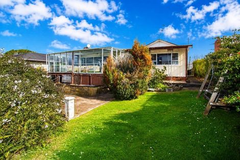 Photo of property in 211 East Coast Road, Castor Bay, Auckland, 0620