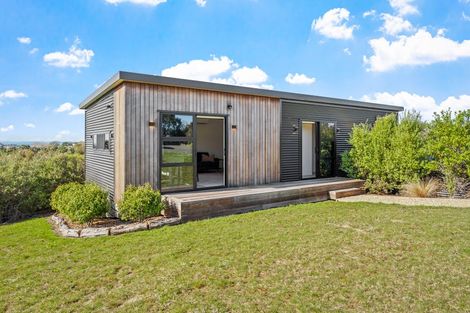 Photo of property in 1119a Whangaparaoa Road, Tindalls Beach, Whangaparaoa, 0930