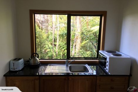 Photo of property in 3 Armour Road, Parau, Auckland, 0604