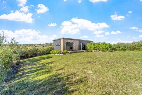 Photo of property in 1119a Whangaparaoa Road, Tindalls Beach, Whangaparaoa, 0930