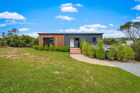 Photo of property in 1117b Whangaparaoa Road, Tindalls Beach, Whangaparaoa, 0930