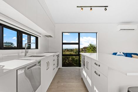 Photo of property in 1119a Whangaparaoa Road, Tindalls Beach, Whangaparaoa, 0930