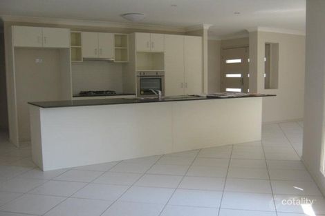 Property photo of 21 Benjamin Court Yamanto QLD 4305