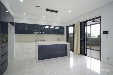Property photo of 25 Waxflower Street Denham Court NSW 2565