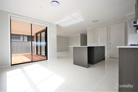 Property photo of 27 Waxflower Street Denham Court NSW 2565