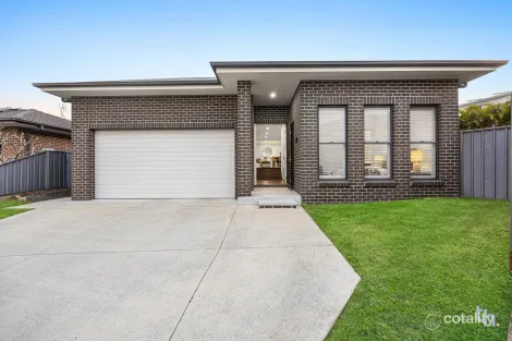 Property photo of 9 Kariba Close Macquarie Hills NSW 2285