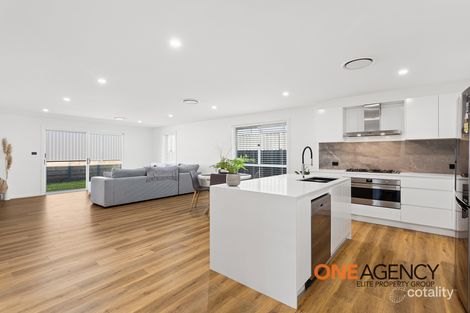 Property photo of 11 Coral Tree Crescent Calderwood NSW 2527