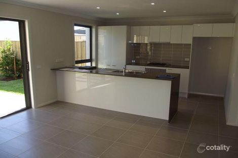 Property photo of 21 Three Bees Drive Glenfield NSW 2167