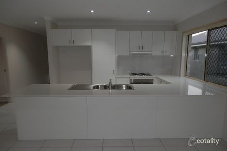 Property photo of 10 Darling Close Pacific Pines QLD 4211