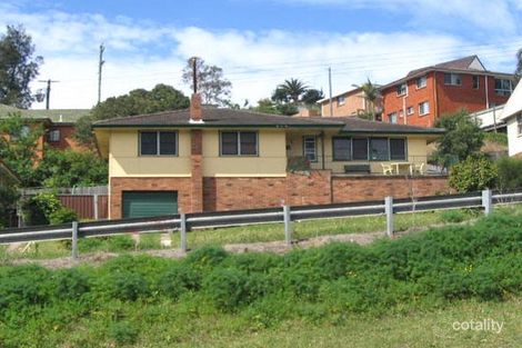 394 Northcliffe Dr, Lake Heights, NSW 2502