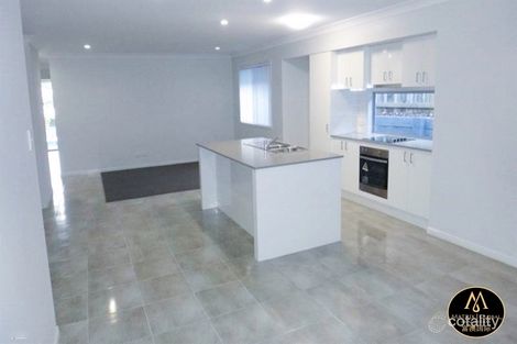 Property photo of 52 Damian Leeding Way Upper Coomera QLD 4209