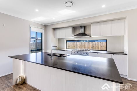 Property photo of 3 Honeysuckle Crescent Bridgeman Downs QLD 4035