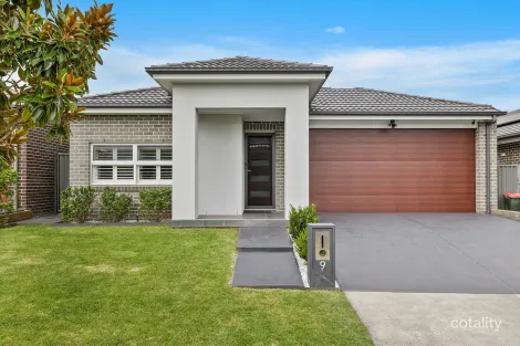 9 Honeybee Cres, Calderwood, NSW 2527