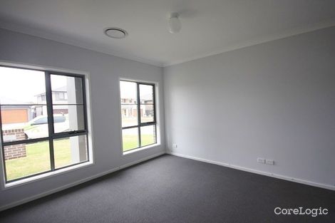 Property photo of 21 Fanflower Avenue Denham Court NSW 2565