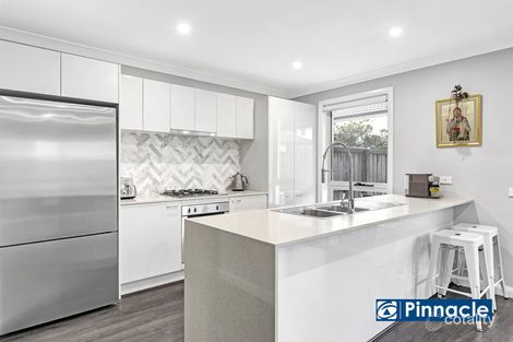 Property photo of 19 Three Bees Drive Glenfield NSW 2167