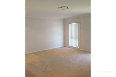 Property photo of 2 Beaumarias Close Cameron Park NSW 2285