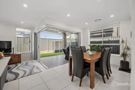 Property photo of 11 Needlebush Avenue Denham Court NSW 2565