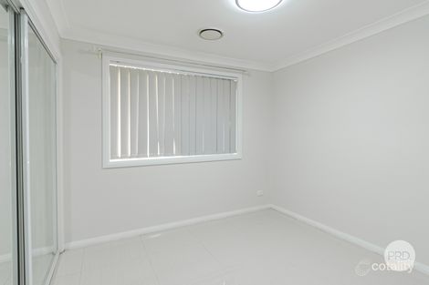 27 Baw Baw Ave, Minto, NSW 2566