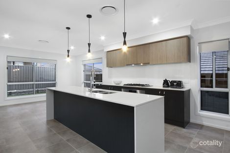Property photo of 18 Jennings Crescent Spring Farm NSW 2570