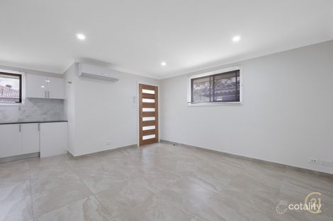 Property photo of 1 Popondetta Place Glenfield NSW 2167