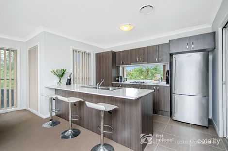 Property photo of 17 Devocean Place Cameron Park NSW 2285