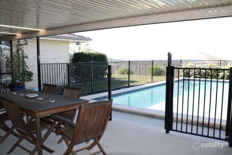 7 Harmsworth Rd, Pacific Pines, QLD 4211