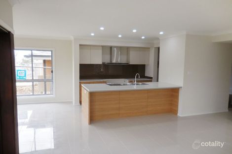 Property photo of 18 Fairbrother Avenue Denham Court NSW 2565