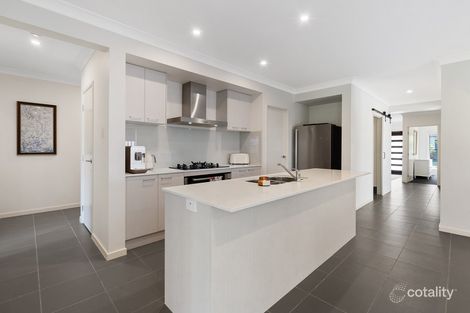 Property photo of 13 Sunwood Crescent Maudsland QLD 4210