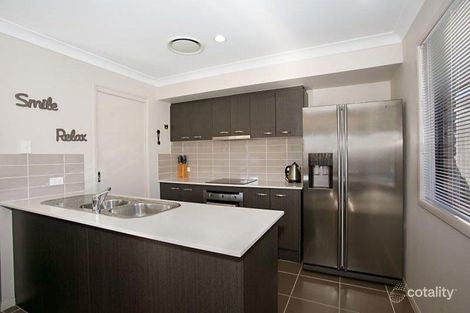 Property photo of 36 Faraday Crescent Pacific Pines QLD 4211