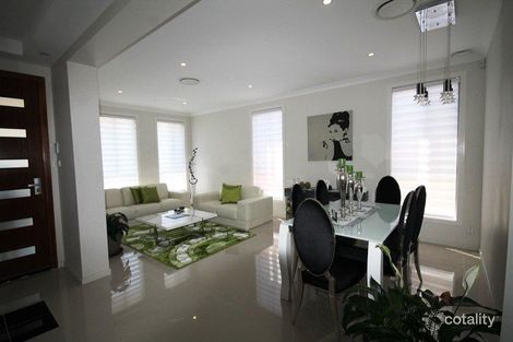 Property photo of 64 Pacific Palms Circuit Carnes Hill NSW 2171