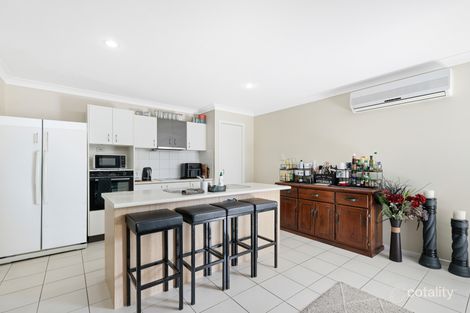 Property photo of 4 Ridgewood Close Pacific Pines QLD 4211