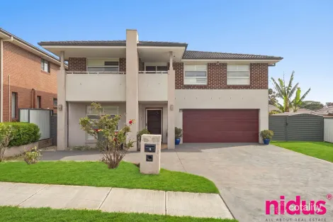 9 AINSLEY AVE, GLENDENNING, NSW 2761