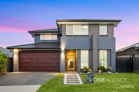 Property photo of 47 Honeybee Crescent Calderwood NSW 2527