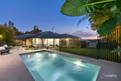 Property photo of 4 Devocean Place Cameron Park NSW 2285