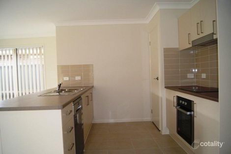 Property photo of 1 Orelia Close Cameron Park NSW 2285
