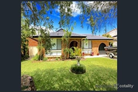 Property photo of 5 Cabbage Tree Palm Crescent Pelican NSW 2281