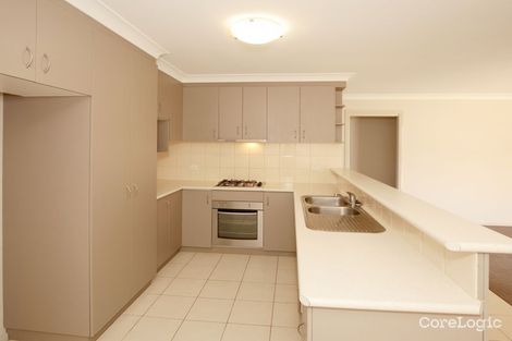 Property photo of 21 Womboin Crescent Glenfield Park NSW 2650