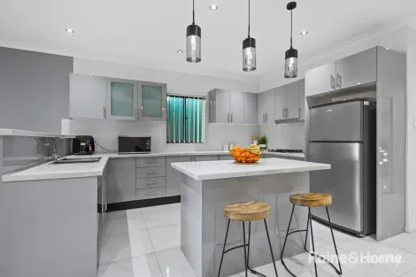 Property photo of 54 Pelargonium Crescent Macquarie Fields NSW 2564