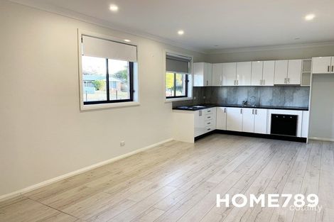 11 Fraser St, Macquarie Fields, NSW 2564