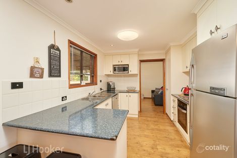Property photo of 12 Warrambool Crescent Glenfield Park NSW 2650