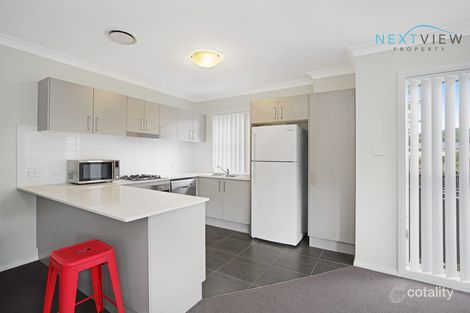 Property photo of 27 Devocean Place Cameron Park NSW 2285
