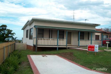1 St Cloud Cres, Lake Heights, NSW 2502