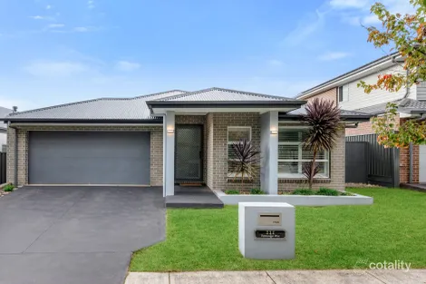 Property photo of 111 Sawsedge Avenue Denham Court NSW 2565