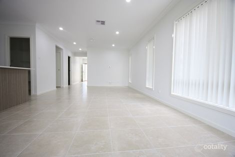 Property photo of 15 Bushpea Avenue Denham Court NSW 2565