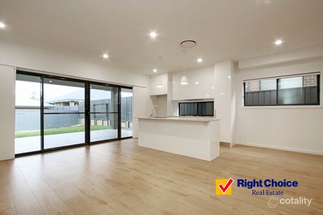 Property photo of 63B Saddleback Crescent Kembla Grange NSW 2526