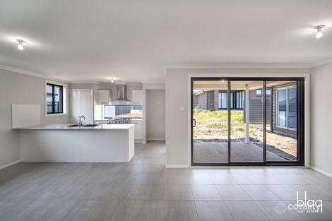 Property photo of 21 Wildflower Crescent Calderwood NSW 2527