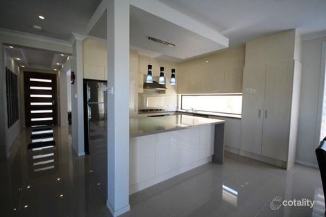 Property photo of 64 Pacific Palms Circuit Carnes Hill NSW 2171