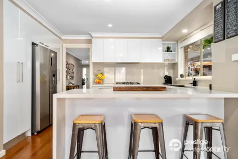 Property photo of 14 Somercotes Court Wattle Grove NSW 2173