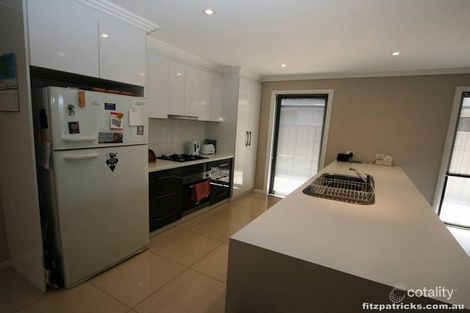 Property photo of 4 Bindari Avenue Glenfield Park NSW 2650